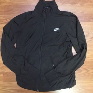 Brown Nike activewear windbreaker style jacket